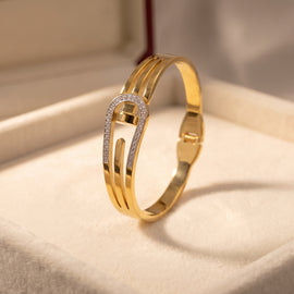 Gold Handcuff with Small Zircon Crystals